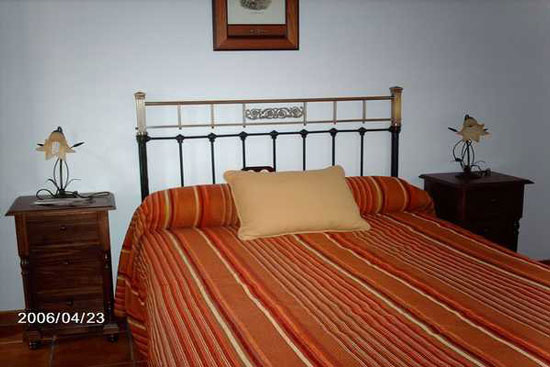 Dormitorio cama matrimonio